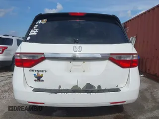 2011 Honda Odyssey EX-L with VIN 5FNRL5H60BB026171, listed as a IAAI auction lot 42511296 with 288,827 mi miles and . Bid and sale history available at DreamBid. Image 16.