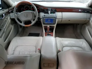 2004 Cadillac DeVille DTS z VIN 1G6KF579X4U203102, wystawiony jako Copart lot #50426955 z przebiegiem 157 290 mil mil oraz Szkody całkowita. Historia ofert i sprzedaży dostępna na DreamBid. Obrazek 8.