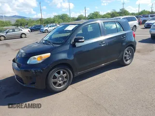 2008 Scion xD with VIN JTKKU10498J006447, listed as a IAAI auction lot 41883311 with 116,444 mi miles. Bid and sale history available at carsss.com. Image 2.