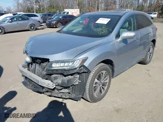 2017 Acura RDX w/Advance Pkg with VIN 5J8TB4H74HL026970, listed as a IAAI auction lot 41602328 with 157,406 mi miles. Bid and sale history available at carsss.com. Image 2.