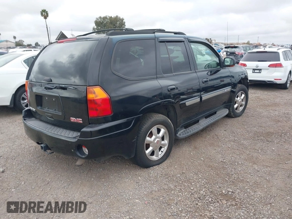 2003 GMC Envoy SLT z VIN 1GKDS13S232298062, wystawiony jako IAAI lot #41668380 z przebiegiem 195 045 mil mil oraz . Historia ofert i sprzedaży dostępna na DreamBid. Obrazek 4.