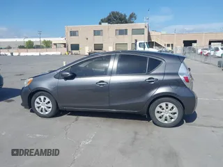2014 Toyota Prius One with VIN JTDKDTB33E1061088, listed as a IAAI auction lot 42040762 with 206,735 mi miles and . Bid and sale history available at DreamBid. Image 14.