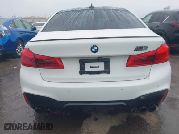 2019 BMW M5 Competition z VIN WBSJF0C52KB447102, wystawiony jako IAAI lot #41778593 z przebiegiem 31 030 mil mil oraz . Historia ofert i sprzedaży dostępna na DreamBid. Obrazek 16.