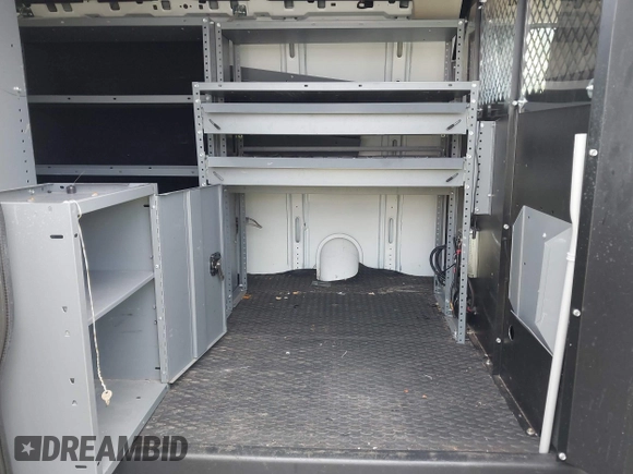 2015 Chevrolet Express Cargo with VIN 1GCWGFCF9F1277631, listed as a IAAI auction lot 42528992 with 243,209 mi miles and . Bid and sale history available at DreamBid. Image 8.