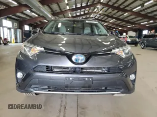 2016 Toyota RAV4 Hybrid XLE with VIN JTMRJREV0GD035203, listed as a Copart auction lot 54300225 with 153,369 mi miles and Salvage Title. Bid and sale history available at carsss.com. Image 5.