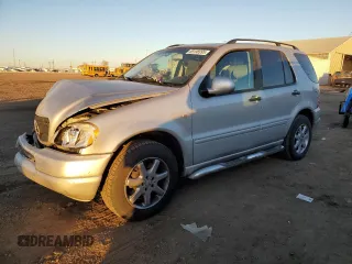 2000 Mercedes-Benz M 320/430/500 with VIN 4JGAB72E1YA199934, listed as a Copart auction lot 89198995 with 128,739 mi miles and Salvage title. Bid and sale history available at DreamBid. Image 1.