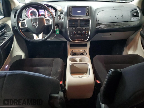 2014 Dodge Grand Caravan SXT with VIN 2C4RDGCG6ER427435, listed as a Copart auction lot 51957355 with 106,078 mi miles and Salvage Title. Bid and sale history available at DreamBid. Image 8.