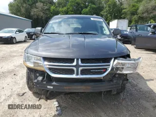 2017 Dodge Journey SXT with VIN 3C4PDDBG9HT639285, listed as a Copart auction lot 58600005 with 124,887 mi miles and Salvage title. Bid and sale history available at DreamBid. Image 5.