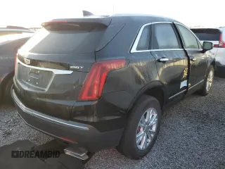 2022 Cadillac XT5 FWD Luxury z VIN 1GYKNAR47NZ100986, wystawiony jako Copart lot #83144574 z przebiegiem Nie podano mil oraz Nie do naprawy • Non repairable. Historia ofert i sprzedaży dostępna na DreamBid. Obrazek 3.