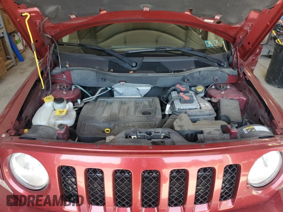 2014 Jeep Patriot Latitude with VIN 1C4NJRFB2ED734624, listed as a Copart auction lot 60675175 with 91,624 mi miles and Salvage title. Bid and sale history available at DreamBid. Image 12.
