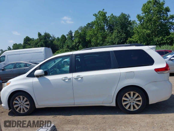 2014 Toyota Sienna Limited with VIN 5TDDK3DC3ES079590, listed as a IAAI auction lot 42694690 with 189,456 mi miles and . Bid and sale history available at DreamBid. Image 14.