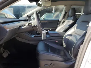 2022 Tesla Model Y Long Range with VIN 7SAYGDEE1NF559238, listed as a Copart auction lot 86744664 with 59,074 mi miles and Salvage Title. Bid and sale history available at carsss.com. Image 7.