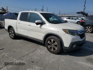 2017 Honda Ridgeline RTL-T with VIN 5FPYK2F65HB011097, listed as a Copart auction lot 63687965 with 186,157 mi miles and Salvage title. Bid and sale history available at DreamBid. Image 4.