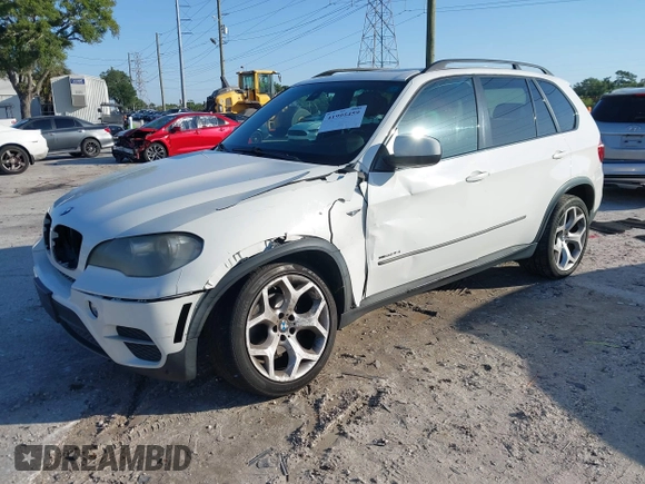 2011 BMW X5 35i with VIN 5UXZV4C52BL410497, listed as a IAAI auction lot 41995459 with 162,781 mi miles. Bid and sale history available at carsss.com. Image 17.