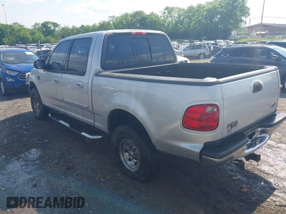 2001 Ford F-150 XLT z VIN 1FTRW07L81KA32285, wystawiony jako IAAI lot #42134835 z przebiegiem 189 109 mil mil oraz . Historia ofert i sprzedaży dostępna na DreamBid. Obrazek 3.