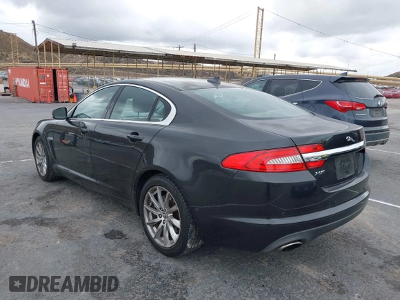 2013 Jaguar XF I4 RWD with VIN SAJWA0ES0DPS64027, listed as a IAAI auction lot 41569121 with 103,115 mi miles. Bid and sale history available at carsss.com. Image 3.