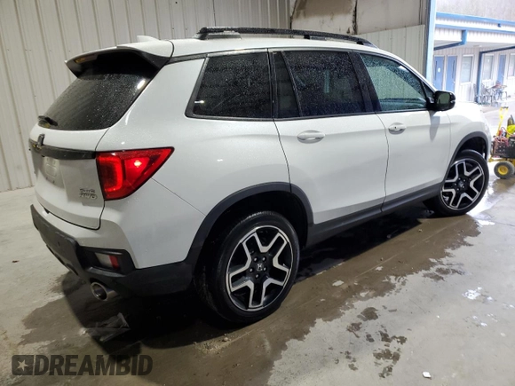 2022 Honda Passport Elite with VIN 5FNYF8H05NB004199, listed as a Copart auction lot 48521594 with 23,913 mi miles. Bid and sale history available at carsss.com. Image 3.