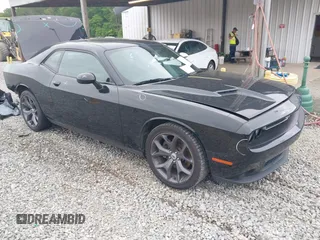 2019 Dodge Challenger SXT z VIN 2C3CDZAG6KH759174, wystawiony jako IAAI lot #42140278 z przebiegiem 141 274 mil mil oraz . Historia ofert i sprzedaży dostępna na DreamBid. Obrazek 1.