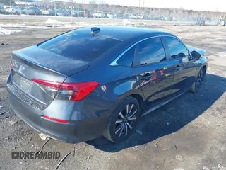 2023 Honda Civic Sedan EX with VIN 2HGFE1F75PH319522, listed as a IAAI auction lot 41317264 with 27,089 mi miles. Bid and sale history available at carsss.com. Image 4.