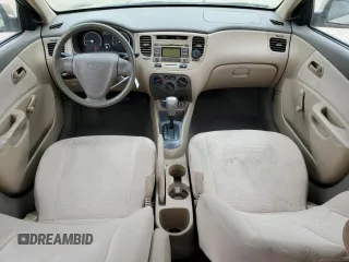 2009 Kia Rio LX with VIN KNADE223496549097, listed as a Copart auction lot 54375975 with 140,882 mi miles and Salvage Title. Bid and sale history available at DreamBid. Image 8.