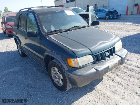 2002 Kia Sportage with VIN KNDJA723425144951, listed as a IAAI auction lot 42049262 with 149,793 mi miles. Bid and sale history available at carsss.com. Image 6.