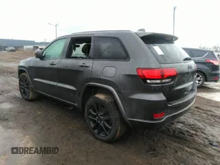 2020 Jeep Grand Cherokee Altitude with VIN 1C4RJFAGXLC211518, listed as a IAAI auction lot 41668994 with 130,371 mi miles. Bid and sale history available at carsss.com. Image 3.
