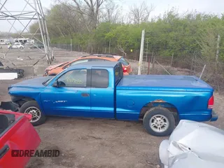 2000 Dodge Dakota with VIN 1B7GL22X8YS774590, listed as a IAAI auction lot 42027035 with 93,092 mi miles and . Bid and sale history available at DreamBid. Image 14.