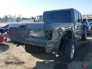 2020 Jeep Gladiator Rubicon with VIN 1C6JJTBG6LL149469, listed as a IAAI auction lot 42224826 with 58,870 mi miles and . Bid and sale history available at DreamBid. Image 4.
