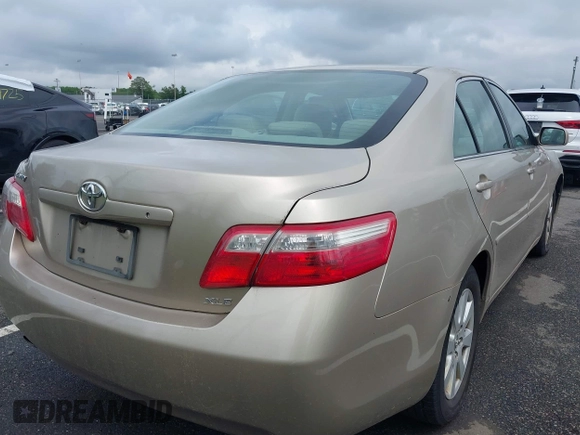 2009 Toyota Camry LE z VIN 4T1BK46KX9U089242, wystawiony jako IAAI lot #42448998 z przebiegiem 252 787 mil mil oraz . Historia ofert i sprzedaży dostępna na DreamBid. Obrazek 4.