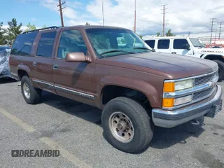 1999 Chevrolet Suburban with VIN 1GNGK26J9XJ494147, listed as a IAAI auction lot 41945149 with 102,652 mi miles. Bid and sale history available at carsss.com. Image 1.