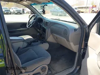 2003 Chevrolet TrailBlazer LTZ with VIN 1GNDT13S832352030, listed as a IAAI auction lot 42207699 with 240,986 mi miles and . Bid and sale history available at DreamBid. Image 5.