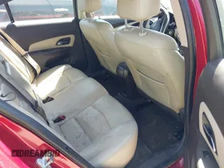 2014 Chevrolet Cruze 2LT z VIN 1G1PE5SB9E7325636, wystawiony jako IAAI lot #41991679 z przebiegiem 103 492 mil mil oraz . Historia ofert i sprzedaży dostępna na DreamBid. Obrazek 8.