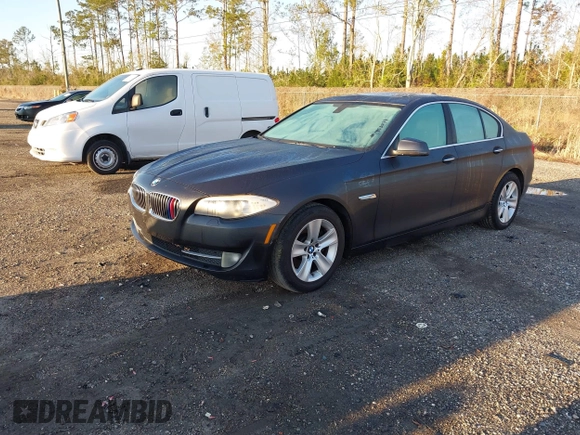 2013 BMW 5 Series 528i with VIN WBAXG5C56DDY31724, listed as a IAAI auction lot 41530179 with 117,876 mi miles and . Bid and sale history available at carsss.com. Image 2.