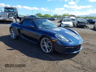 2018 Porsche 718 Boxster z VIN WP0CA2A8XJS210766, wystawiony jako IAAI lot #41617239 z przebiegiem 55 336 mil mil oraz . Historia ofert i sprzedaży dostępna na DreamBid. Obrazek 1.