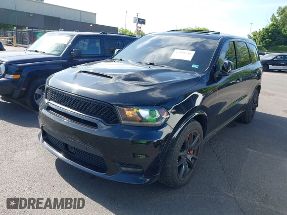 2018 Dodge Durango SRT с VIN 1C4SDJGJ5JC142443, выставлен на аукционе IAAI как лот 42401246 с пробегом 106 260 миль миль и . История ставок и продаж доступна на DreamBid. Изображение 22.
