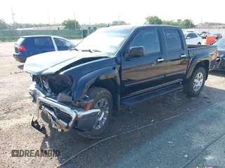 2012 GMC Canyon SLE2 with VIN 1GTH6PFE4C8156674, listed as a IAAI auction lot 42446335 with 130,464 mi miles and . Bid and sale history available at DreamBid. Image 2.