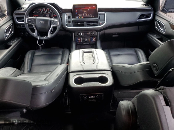2021 Chevrolet Suburban Z71 с VIN 1GNSKDKD9MR385447, выставлен на аукционе Copart как лот 55764935 с пробегом 74 241 миль миль и Списание • Salvage title. История ставок и продаж доступна на DreamBid. Изображение 8.