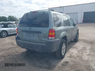 2007 Ford Escape XLT with VIN 1FMYU03187KA16422, listed as a IAAI auction lot 42168052 with 189,757 mi miles and . Bid and sale history available at DreamBid. Image 4.