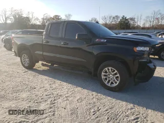 2019 Chevrolet Silverado 1500 RST with VIN 1GCRYEED1KZ351071, listed as a Copart auction lot 82500904 with 24,936 mi miles and Salvage Title. Bid and sale history available at DreamBid. Image 4.