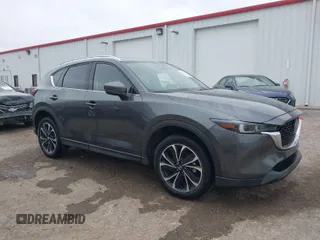 2023 Mazda CX-5 2.5 S Premium Plus Package with VIN JM3KFBEM2P0163054, listed as a IAAI auction lot 41642461 with 18,508 mi miles. Bid and sale history available at carsss.com. Image 1.
