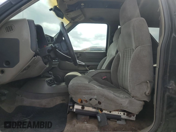 1999 Chevrolet Blazer LS with VIN 1GNCT18W6XK224253, listed as a Copart auction lot 50708405 with 209,711 mi miles and Salvage title. Bid and sale history available at DreamBid. Image 7.