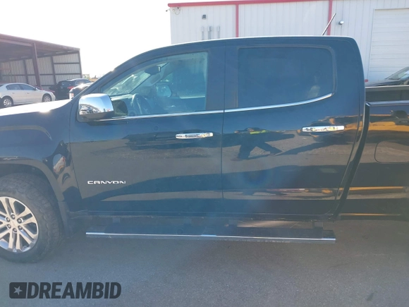2015 GMC Canyon 4WD SLT z VIN 1GTG6CE33F1134747, wystawiony jako IAAI lot #41502300 z przebiegiem 143 027 mil mil oraz . Historia ofert i sprzedaży dostępna na DreamBid. Obrazek 15.