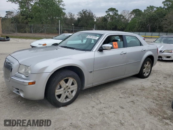 2006 Chrysler 300 C with VIN 2C3KK63H86H345499, listed as a Copart auction lot 87610725 with 171,589 mi miles and Salvage Title. Bid and sale history available at carsss.com. Image 1.