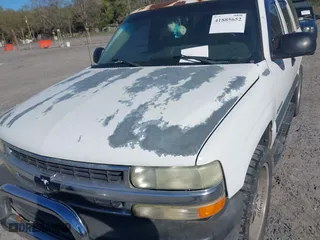 2003 Chevrolet Tahoe LS with VIN 1GNEC13V23J329623, listed as a IAAI auction lot 41885652 with 277,112 mi miles. Bid and sale history available at carsss.com. Image 6.