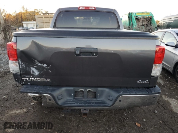 2011 Toyota Tundra 4WD Truck with VIN 5TFDY5F12BX205210, listed as a Copart auction lot 79915794 with 214,543 mi miles and Salvage Title. Bid and sale history available at carsss.com. Image 6.