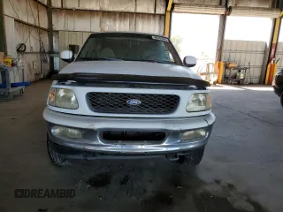 1998 Ford F-150 с VIN 1FTRX18L0WKA53124, выставлен на аукционе Copart как лот 66466945 с пробегом 252 908 миль миль и Чистый • Clean title. История ставок и продаж доступна на DreamBid. Изображение 5.
