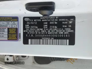 2013 Kia Optima SX z VIN 5XXGR4A63DG100161, wystawiony jako Copart lot #55036865 z przebiegiem Nie podano mil oraz Szkoda całkowita • Salvage title. Historia ofert i sprzedaży dostępna na DreamBid. Obrazek 13.