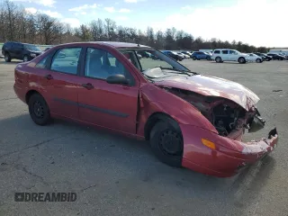 2003 Ford Focus LX with VIN 1FAFP33P53W108234, listed as a Copart auction lot 44798935 with 72,634 mi miles and Salvage Title. Bid and sale history available at carsss.com. Image 4.