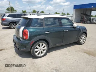 2013 MINI Countryman S with VIN WMWZC3C58DWP21965, listed as a Copart auction lot 61161735 with 142,797 mi miles and Salvage title. Bid and sale history available at DreamBid. Image 3.