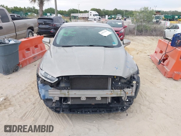 2015 Ford Fusion SE with VIN 3FA6P0H70FR211303, listed as a IAAI auction lot 41879349 with 104,896 mi miles. Bid and sale history available at carsss.com. Image 6.